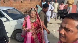 Bride casts vote in Indian general election straight after wedding