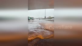 Dubai police direct traffic during severe floods