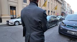 Hollywood Superstar Tom Cruise helps out a Paparazzi who had fallen over oitside of Victoria Beckhams birthday