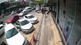 Road rage drivers fight in brawl when one of them cut lane to park