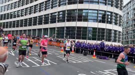 London Marathon 2024 runners near Tower Bridge, past the 23 Mile mark