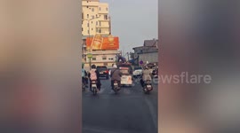 Motorists spot man wearing Spiderman costume on Tuk-tuk roof