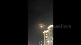 Mysterious glowing object with sparking tail streaks across northwestern China's sky