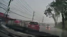 Wind blows tent onto power lines during storm