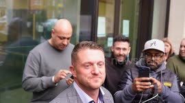Tommy Robinson speaks to supporters after trial following arrest at London antisemitism march
