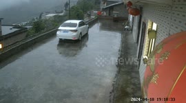 Lightning strikes house roof causing shower of molten sparks