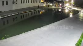 Mercedes driver confuses pond with rain covered car park