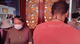 Experiencing temple fair parade in S China with U.S. expat
