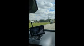 Raccoon Hitches a Ride on Moving House