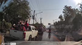 Huge python emerges on road during water fight
