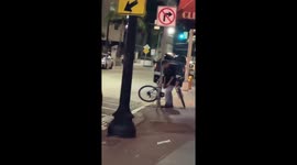 Man Stumbles and Falls Into Street