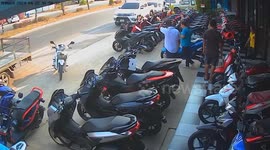 Driver falls asleep and crashes into motorcycle shop