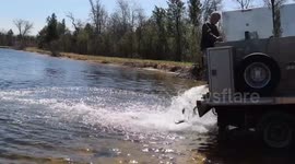 USA: U.S. Fish and Wildlife Service fish hatchery personnel stock fish at Fort McCoy 3