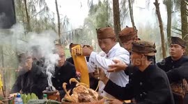 residents of Perch Mount Bromo pray