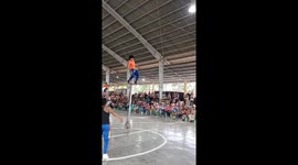 Unicycle basketball amuses crowd in the Philippines