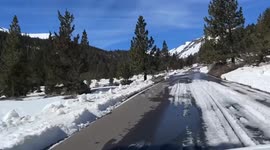 Snow ploughs clear roads following snow in California