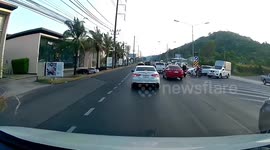 Foreign motorist crashes into rider