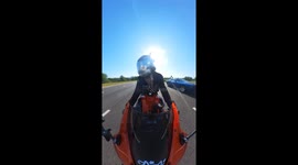 Motorcyclist's unusual landing: Rear-ends pickup, lands in truck bed
