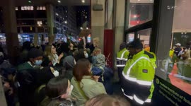 Pro-Palestinian demonstrators chant “let us in” at Fashion Institute of Technology in New York