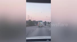 Bus tilts on road carrying students and teachers from trip