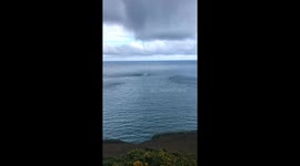 Walker catches incredible moment of a beautiful photogenic isolated waterspout spawning off Cornwall's coast