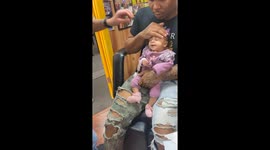 Baby is NOT A FAN of getting her ears pierced