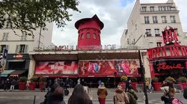 The Moulin Rouge's iconic windmill lost its sails when they mysteriously fell off Thursday night outside of the historic Parisian cabaret.  Paris, France. (Video from friday 26 april 2024)
