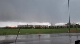 Destructive tornado strikes Lincoln, Nebraska, lofting debris