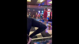 Man Struts By In Miniskirt And Stilettos