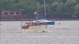 Motor yacht flotilla greets Medway Queen for 100th birthday off Kent, UK