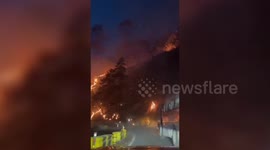 Officials conduct rescue operation after massive forest fire breaks out in northern India