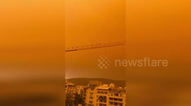 Saharan dust clouds turn skies in Greece orange