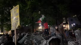 Protesters at George Washington University have stormed the police barricades onto the U-Yard grounds