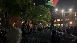 Protesters at George Washington University have stormed the police barricades onto the U-Yard grounds