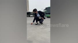 Bus driver shows her motoring skills by manoeuvring around eggs