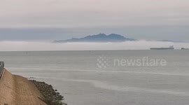 Magical mirage transforms coastline into enchanted wonderland in China