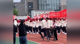 Human-like robot joins cheer squad at college sports event