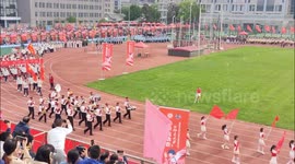 Robot joins students for sports meeting at university in China