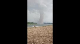 Huge waterspout tornado rips through estuary in the Philippines