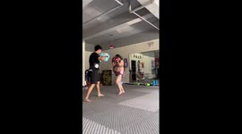 Eight-month-pregnant mother-to-be does boxing workout