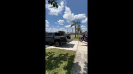 Motorcycle Falls Off Loading Ramp