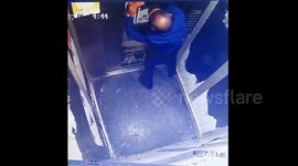 Elderly Chinese man forced to pry elevator open to rescue dog trapped in doors