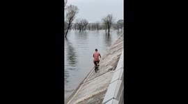 Elderly cyclist's gravity-defying ride amazes onlookers in northwest China