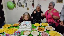 Joyful chaos: birthday bash turns into cake-smearing delight