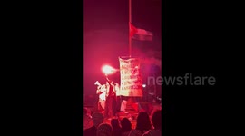 USA: Chanting in Arabic with flares lit at the Gaza Solidarity Encampment in NYC