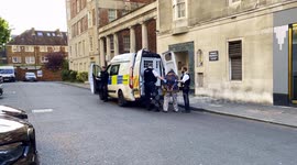 A Team Officers Of The MET Police Stop and Search and Arrest Suspect