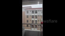 China: Strong wind blows clothes off balconies in Zhangzhou, Fujian