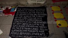 USA: Signs and banners at the Gaza Solidarity Encampment in Manhattan, NYC