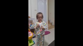 Cute toddler singing