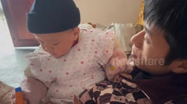 Baby slaps dad: hilarious moment caught on camera